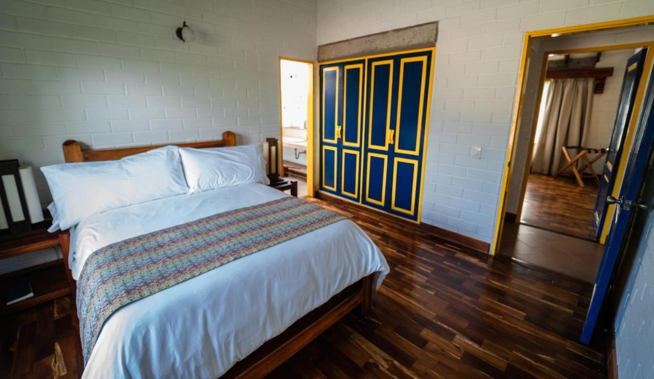马尼萨莱斯 Termales El Otono酒店 外观 照片 A bedroom at the hotel