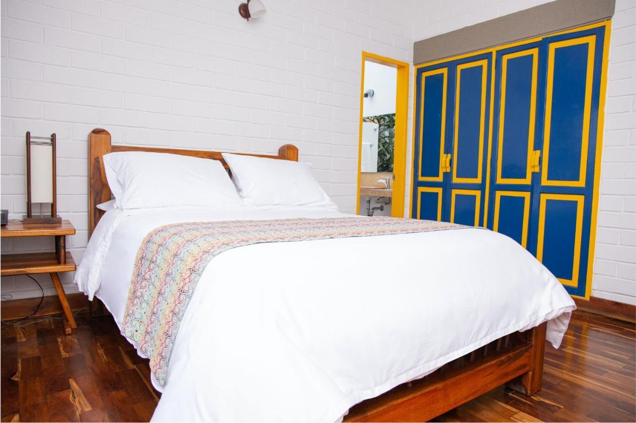 马尼萨莱斯 Termales El Otono酒店 外观 照片 A bedroom at the hotel