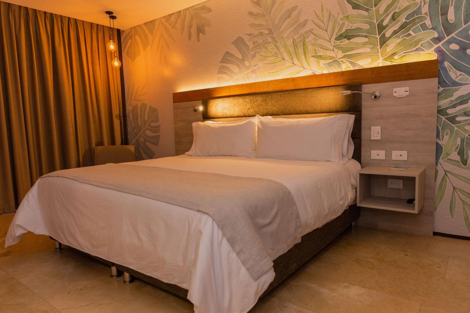马尼萨莱斯 Termales El Otono酒店 外观 照片 A bedroom at the hotel