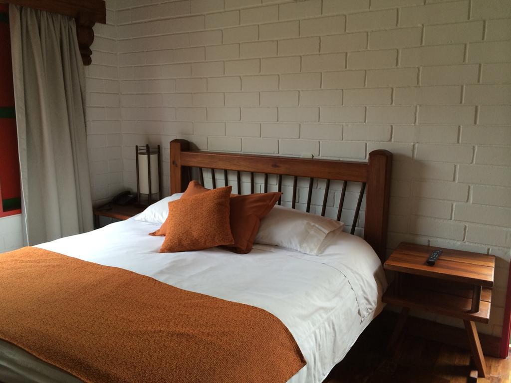 马尼萨莱斯 Termales El Otono酒店 外观 照片 A bedroom at the hotel